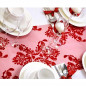 Camino de mesa de organza roja con decoración